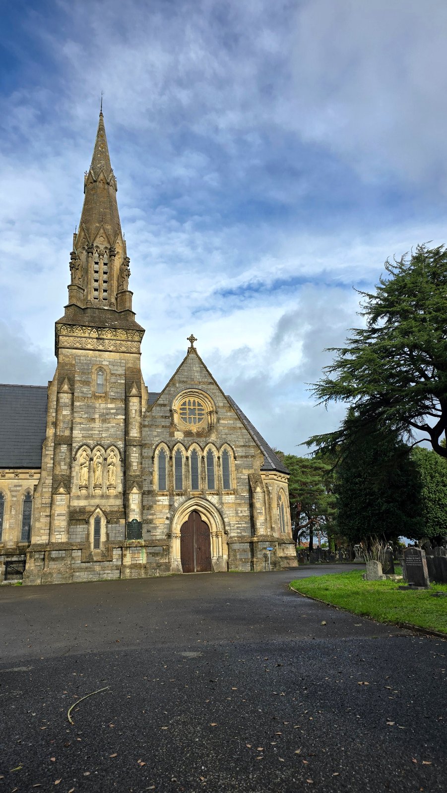 Tree-lined main avenue at Wimborne Road Cemetery
