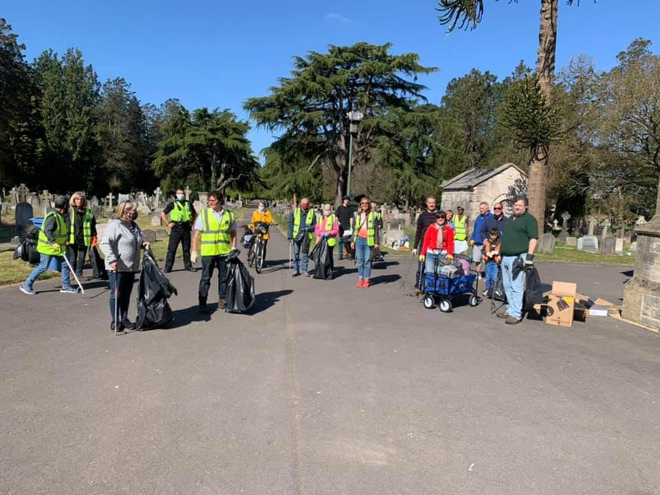 Volunteers gathered at a litter pick in Wimborne Road Cemetery