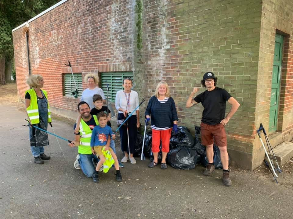 Residents of different ages taking part in a community litter pick