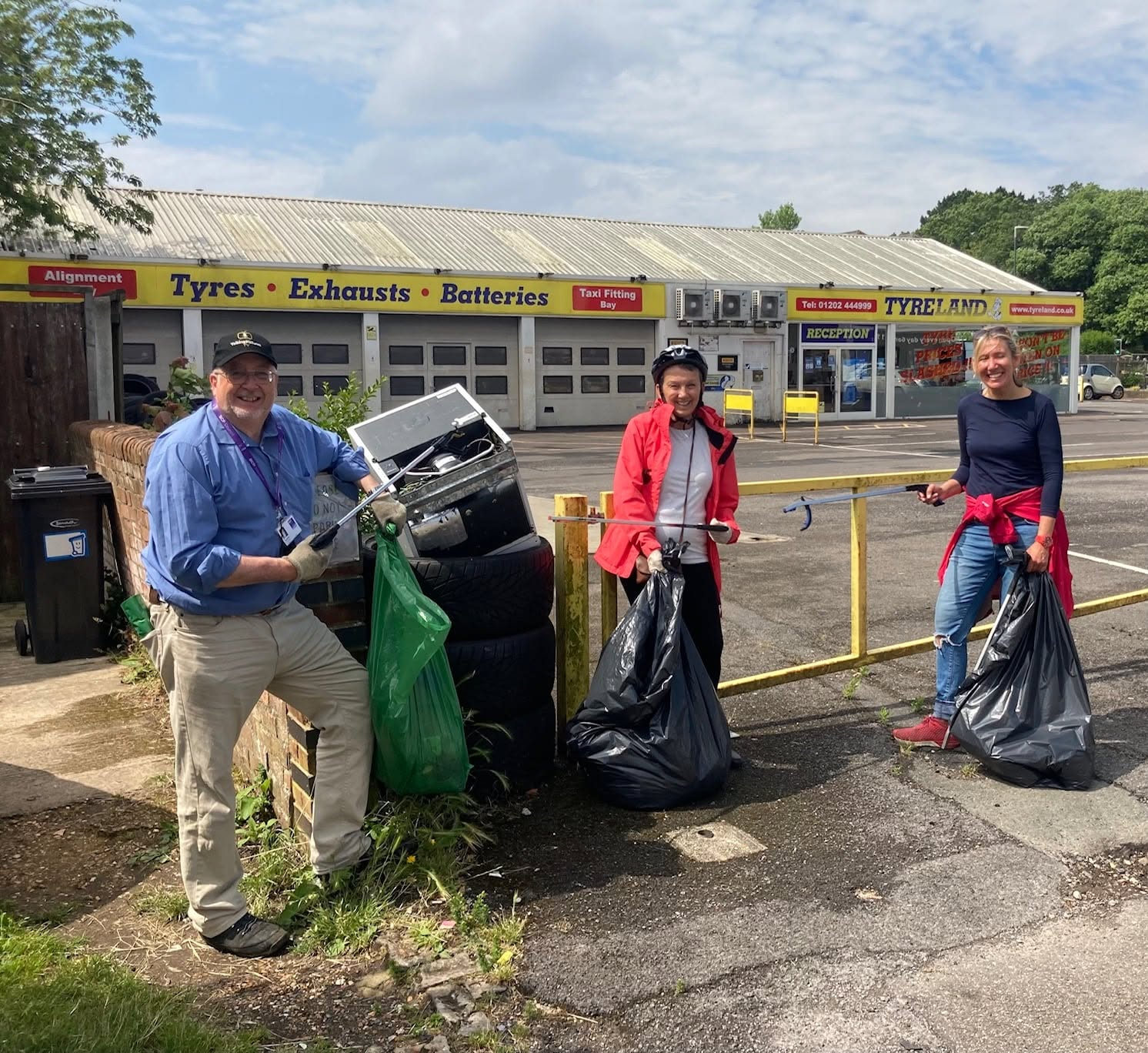 Local residents taking part in a neighbourhood litter pick